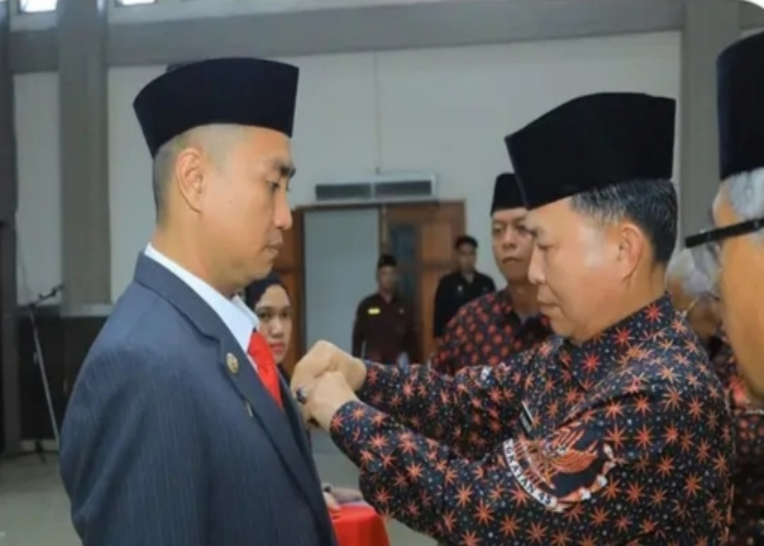 Bupati Hendri Yanto Sitorus Terima Medali Kejuangan 9 Windu dari DHD 45